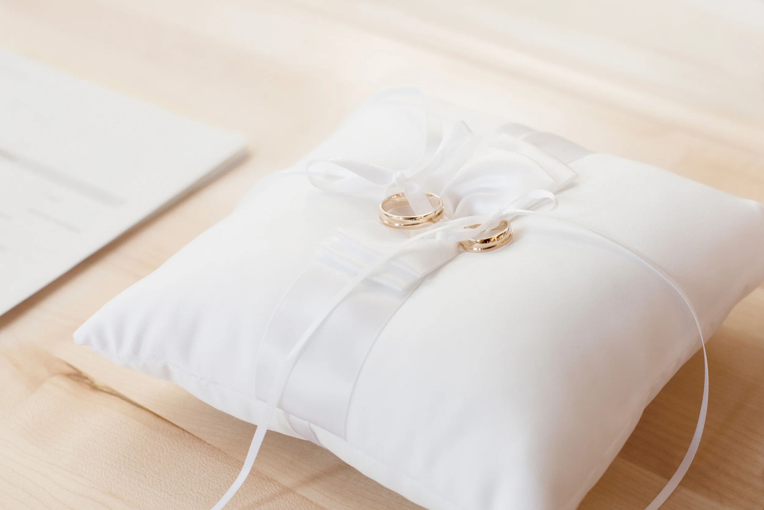 wedding rings on pillow